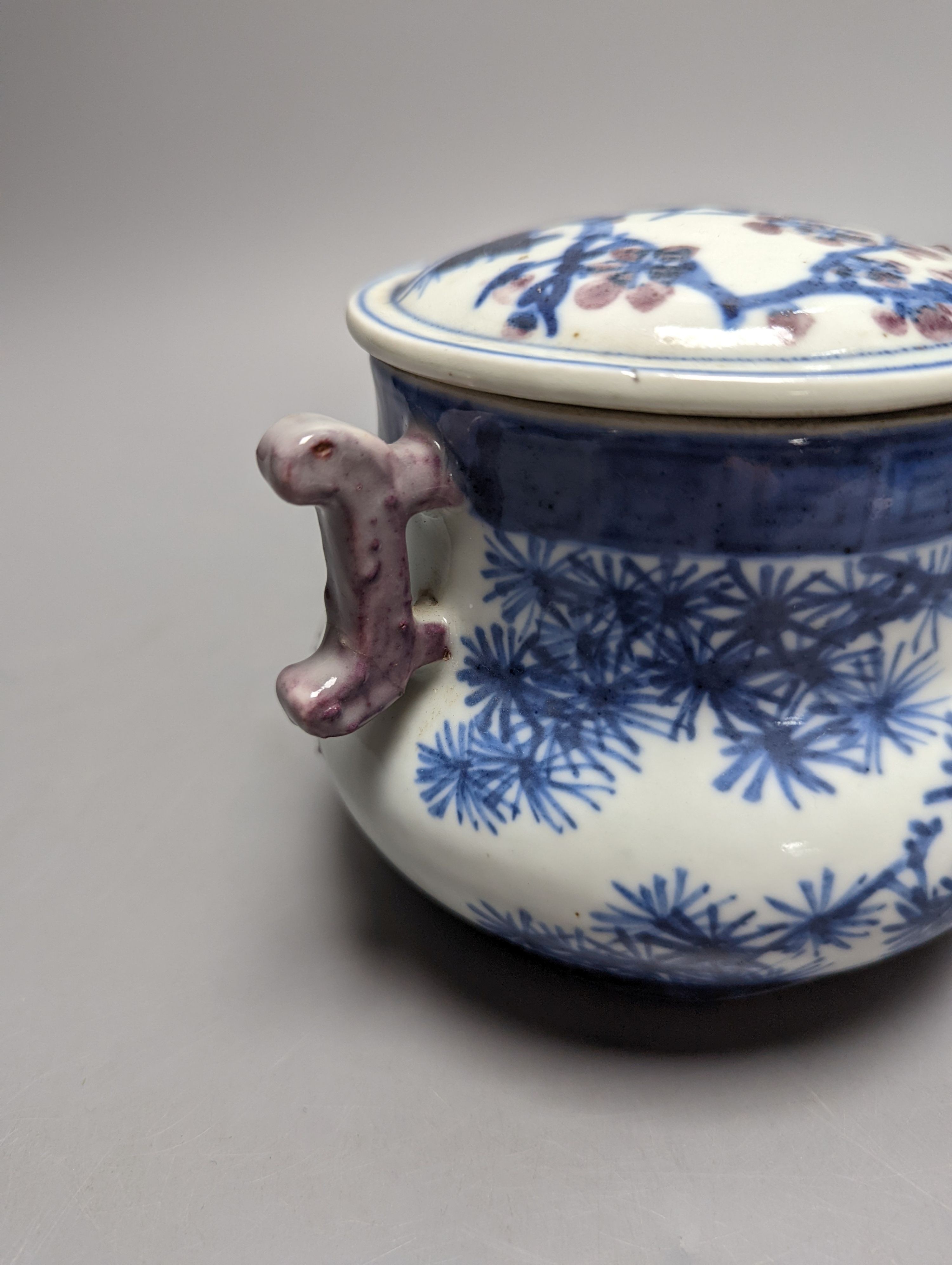 A Chinese underglaze blue and copper red jar and cover, Xuande six character mark but later 12cm